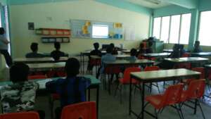 Boys participate in a workshop