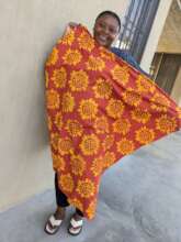 New Team Member Faiza with her hand batiked Cloth