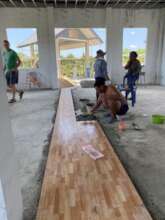 Laying tile in the library