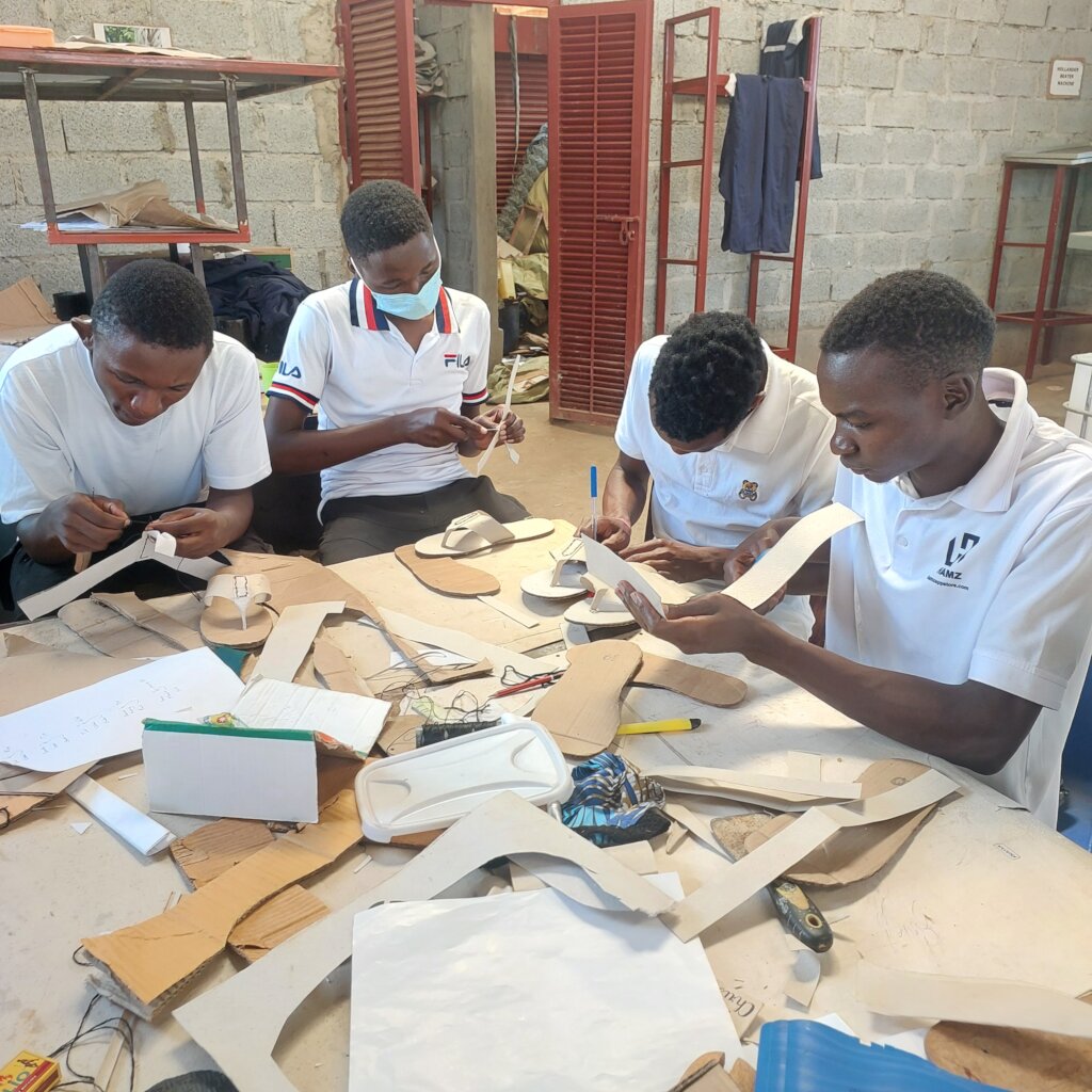 Bio-waste students making templates to make shoes