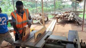 Students working in carpentry workshop