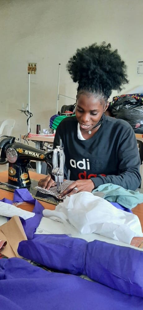 A student in tailoring class