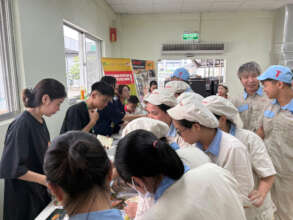 RICOH factory workers at an ENV awareness event