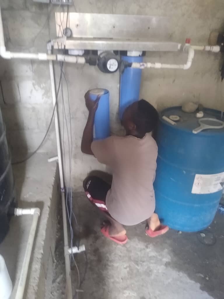 Chelo performing water house maintenance