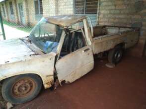 An old car being used for students to learn repair