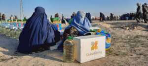 Afghan women participate in donation distribution