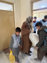 A family receiving food supply