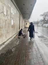 Working as a shoe shiner on the street