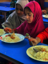Students eating lunch at school
