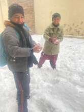 Raqibs's sons after their lesson at the center