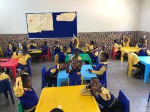 Learners recieving a Nkosi Bar