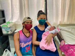 Happy couple with a healthy baby