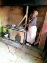 Sarah the cook using the new stove