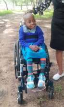 Marci is fitted with her first ever wheelchair