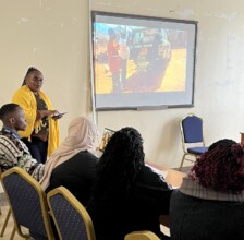 Teacher explains her project implementation
