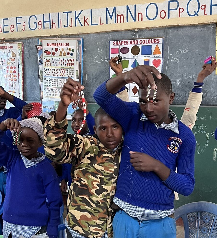 Learners showing their beadwork at Thinu