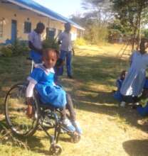Marci rejoins school with her new wheelchair