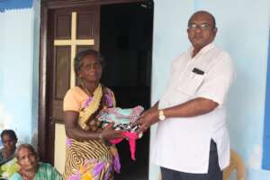 Distribution of sparingly used cloths to the poor