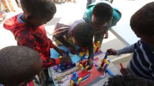 IDP children with donated Educational material