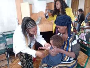 partial picture of  MHO  Nurse  in serving  needy