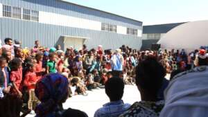 out of school children  attending stage perforamn