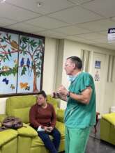 Dr. Forbess conferring with family in Costa Rica