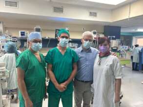 Dr. Pizarro and Dr. Casta with local members