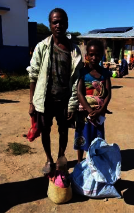 Mbola and one of his daughters