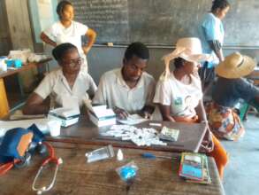 Mobile CSB workers preparing malaria test kits