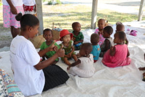 Model Mother playing with children