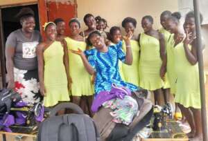 Trainees are happy with the dresses they've made