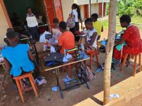 12 young people are learning tailoring