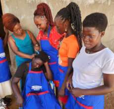 15 young people are learning hairdressing
