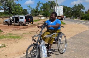 Maria uses her tricycle to stock her shop