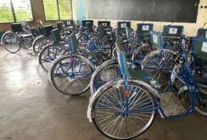 Tricycles for disabled people awaiting collection.