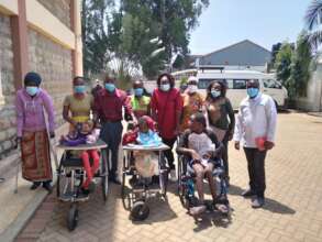 Young people in Migori with their wheelchairs.
