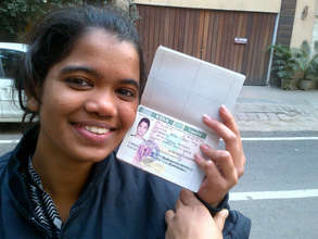 Kavita with her passport and Morocco visa