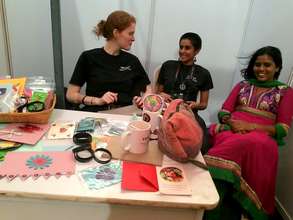 Staff making a living selling our handmade cards!