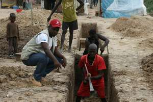 Building latrines to meet urgent sanitation needs