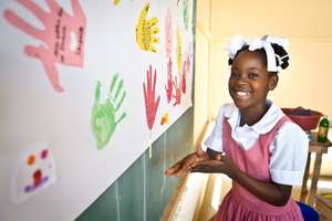 In Haiti, Abigail loves her art therapy program