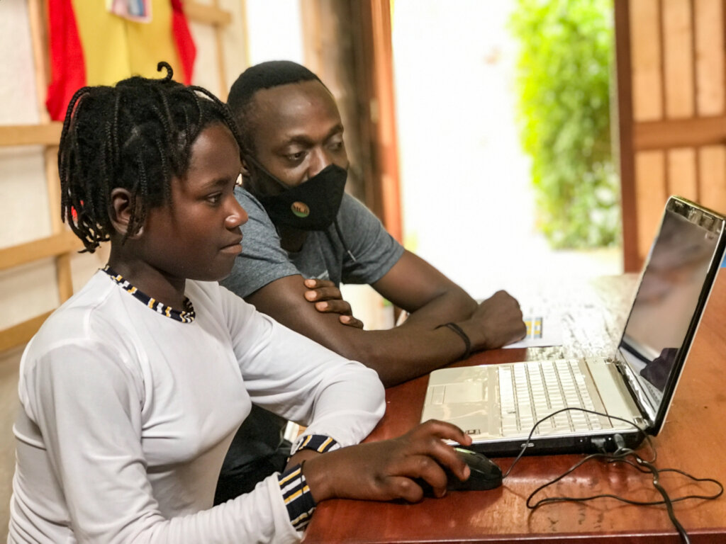 A year 6 student enjoying her one-to-one IT lesson