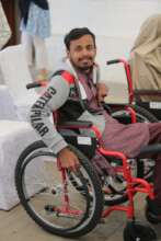 Beneficiary with their wheelchair!