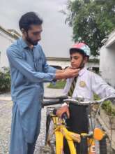 Safety helmets being provided to students