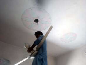 ceiling fan being installed in the class amid hot
