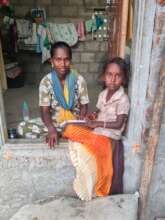 Child with her mother starting to study at home