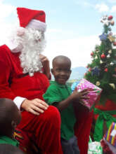 Santa brings a huge smile to Natasha's face.