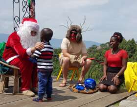 Who is this mysterious man in red with the beard?
