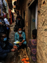 HSC visiting a patient in Katanga