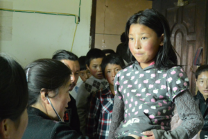 Young Khampa Girl examination