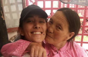 Achi, Clinic Mgr (r). iana Weingrad volunteer, (l)